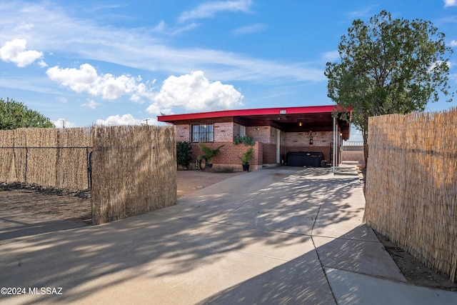 view of front of house featuring a carport