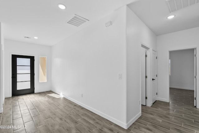 foyer with hardwood / wood-style floors