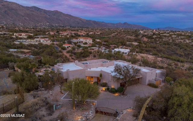 aerial view at dusk with a mountain view