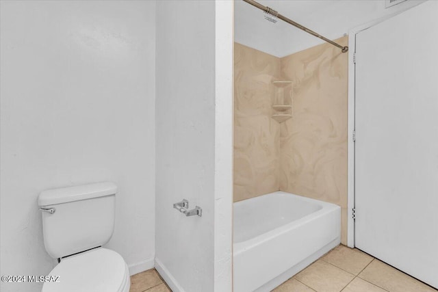 bathroom with tile patterned floors, toilet, and shower / bathing tub combination