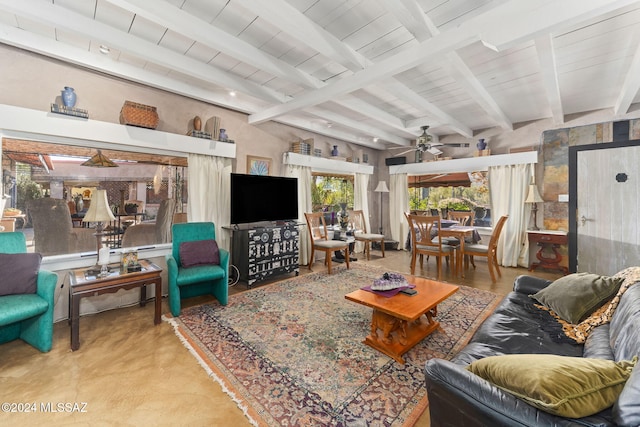 living room with beam ceiling and ceiling fan