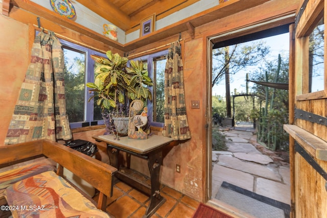 sunroom / solarium with a wealth of natural light