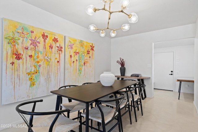 dining room with a chandelier