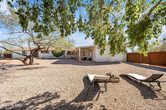 back of house with a patio area