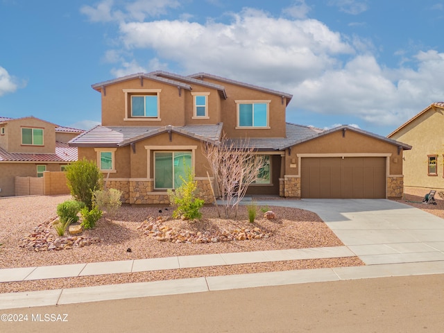 view of front of property with a garage