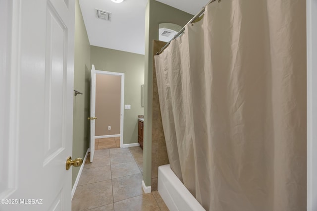 bathroom with tile patterned floors and vanity