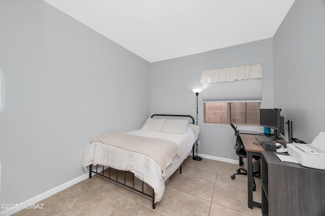 bedroom featuring light tile patterned flooring