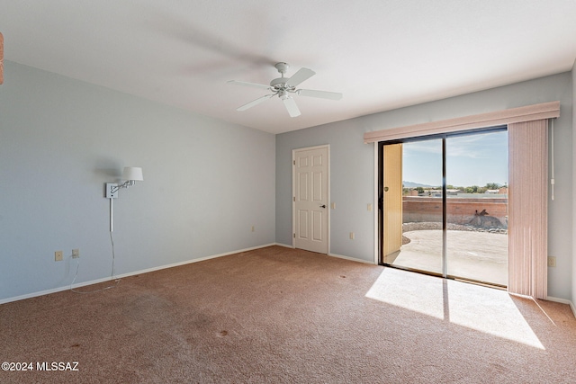 carpeted empty room with ceiling fan