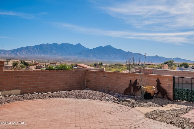 view of patio / terrace featuring a mountain view