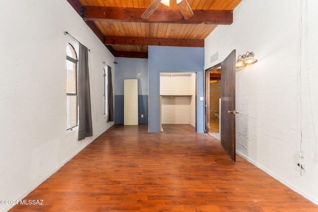 hallway featuring hardwood / wood-style floors, beam ceiling, and wood ceiling