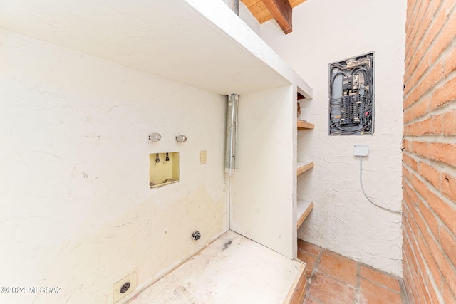 laundry area with hookup for a gas dryer and hookup for a washing machine