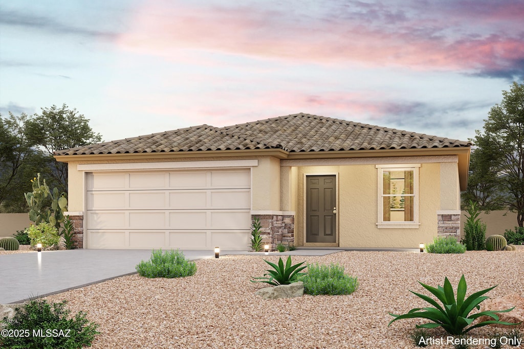 mediterranean / spanish-style home with stucco siding, an attached garage, stone siding, driveway, and a tiled roof