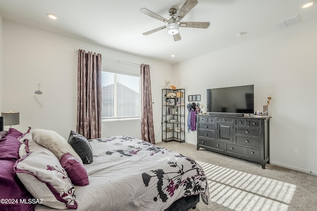 carpeted bedroom with ceiling fan