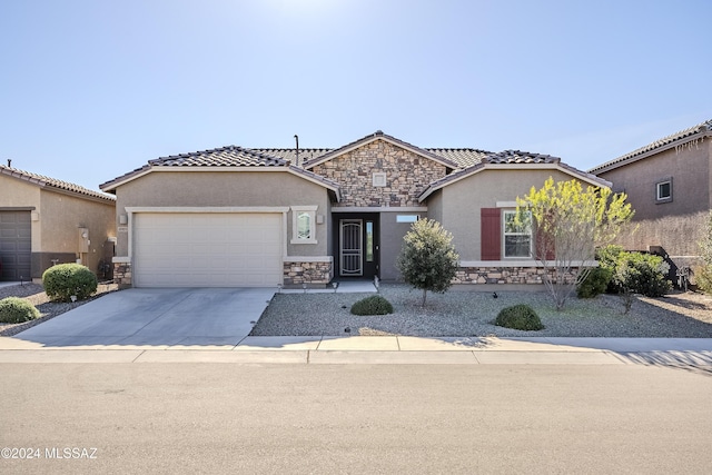 view of front of property featuring a garage