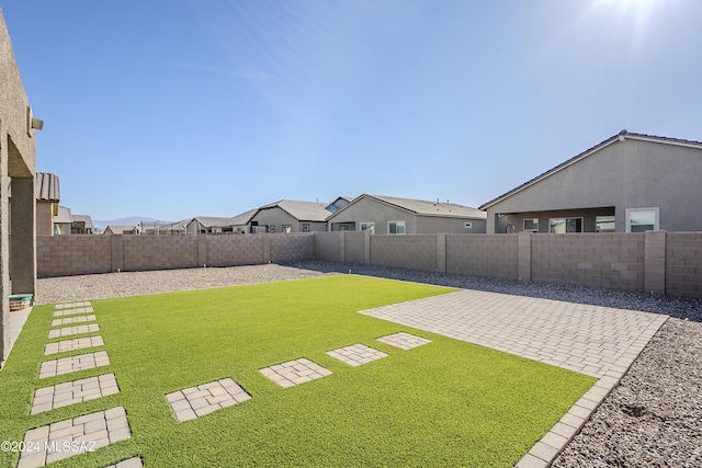 view of yard with a patio area