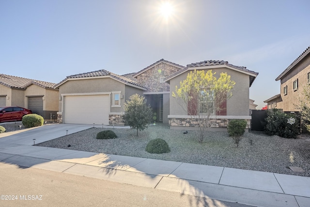 view of front of property with a garage