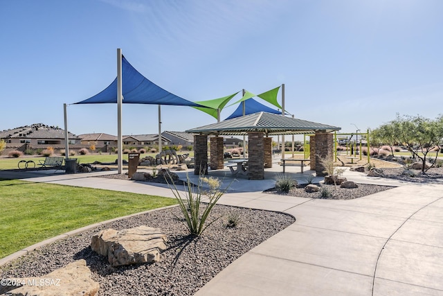 view of home's community featuring a gazebo and a lawn