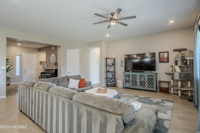 living room with ceiling fan