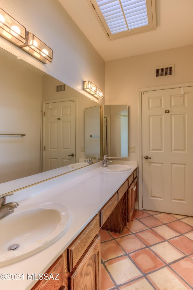 bathroom featuring vanity and tile patterned floors