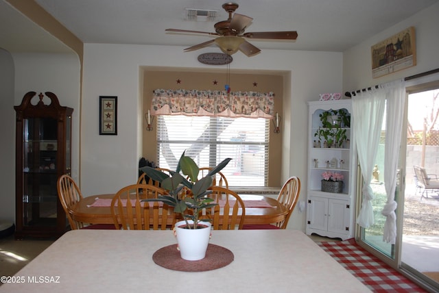 dining area with ceiling fan