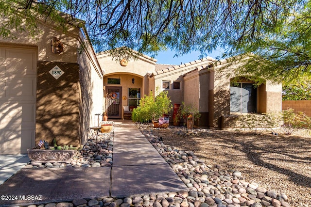 view of front of home with a garage