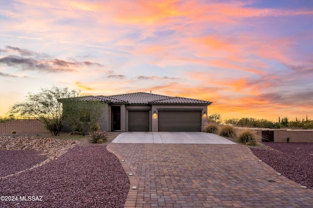 view of front of house with a garage