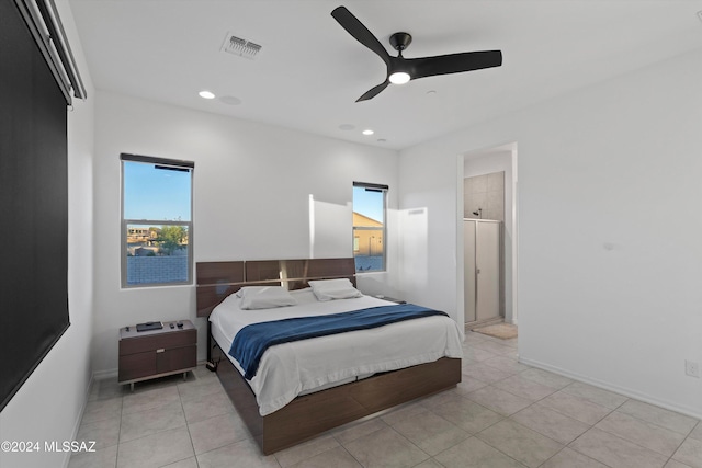 bedroom featuring ceiling fan and light tile patterned floors