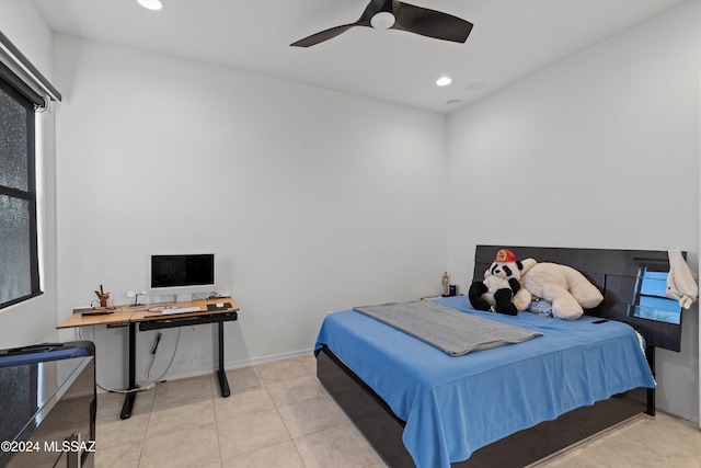 tiled bedroom with ceiling fan