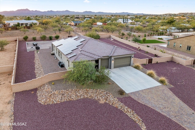 drone / aerial view featuring a mountain view