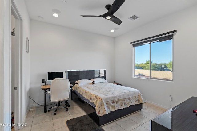 bedroom featuring ceiling fan and light tile patterned flooring