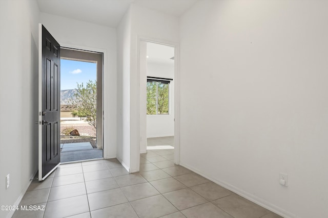 tiled foyer with a mountain view