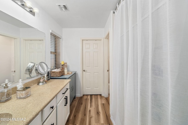 bathroom featuring hardwood / wood-style flooring