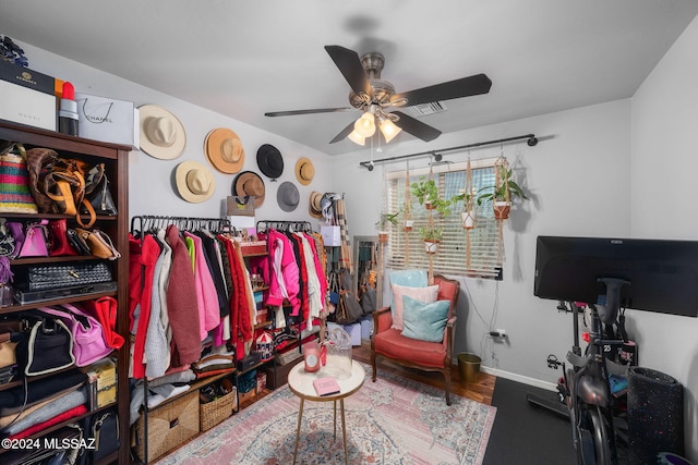 spacious closet with ceiling fan