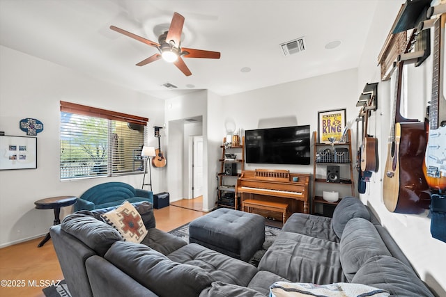 living room with ceiling fan