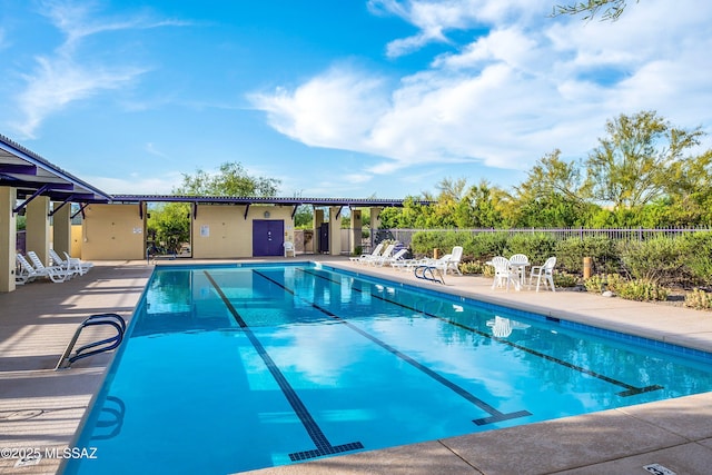 view of swimming pool featuring a patio