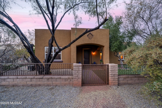 view of adobe home