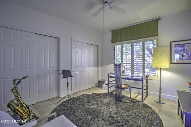 interior space featuring ceiling fan