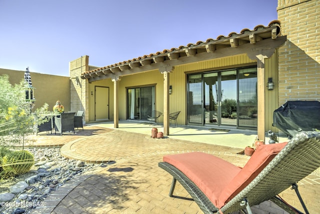 rear view of house with a patio