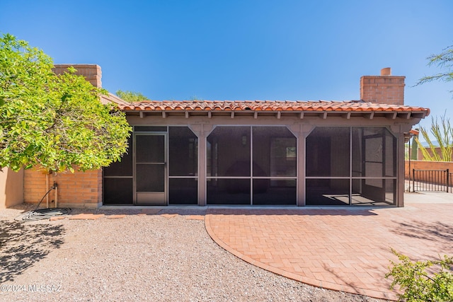 rear view of house with a patio area