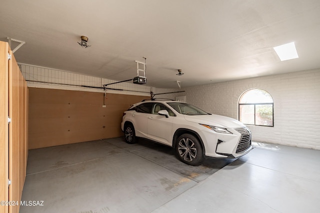 garage featuring a garage door opener