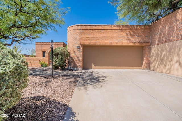 view of front of property featuring a garage