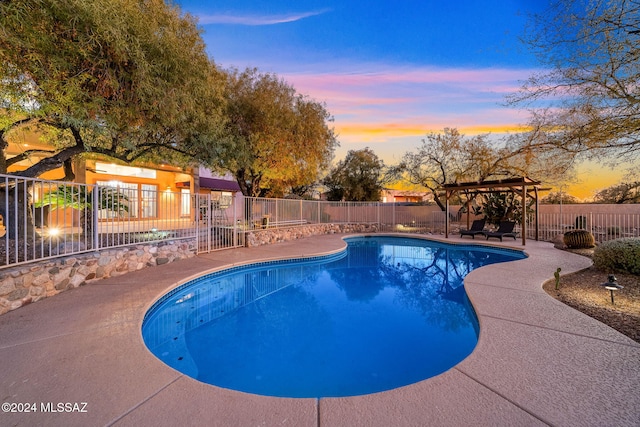 pool at dusk featuring a patio and a pergola