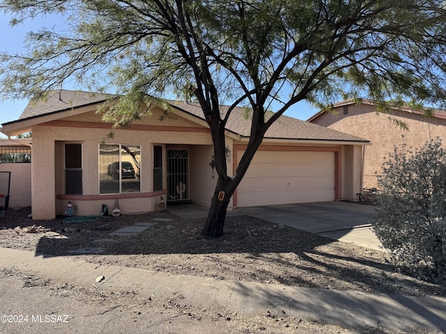 view of front of property featuring a garage