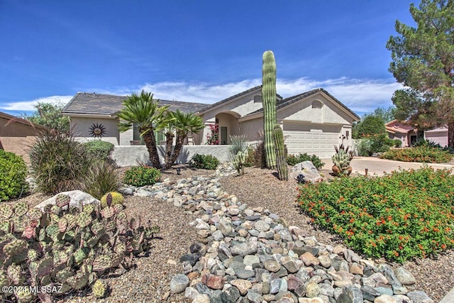 ranch-style home with a garage