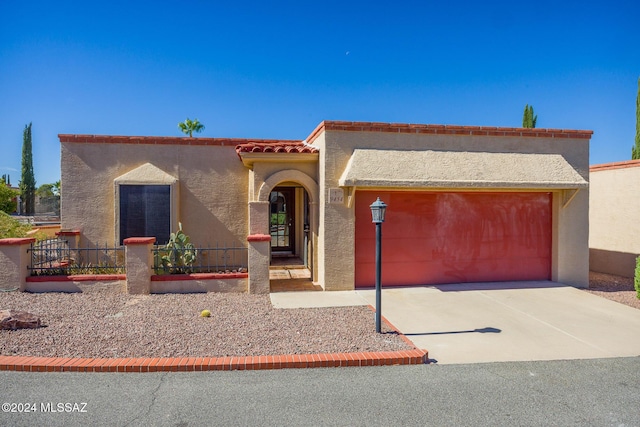 view of front of house with a garage