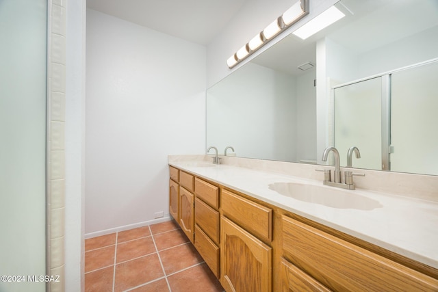 bathroom featuring tile patterned floors and vanity