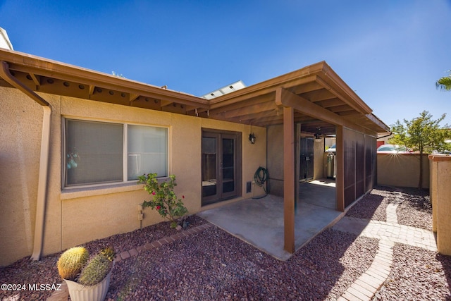 back of house featuring french doors and a patio