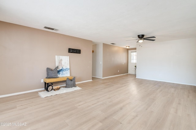 spare room with ceiling fan and light hardwood / wood-style floors