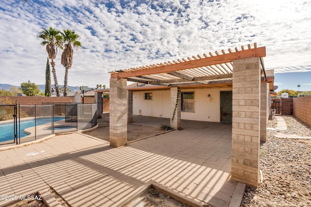 view of patio featuring a fenced in pool