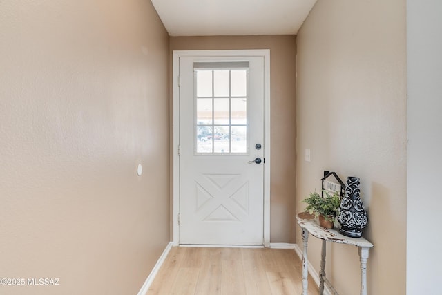 doorway featuring light hardwood / wood-style floors